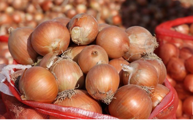 Why is the price of onions going up in Tajikistan?