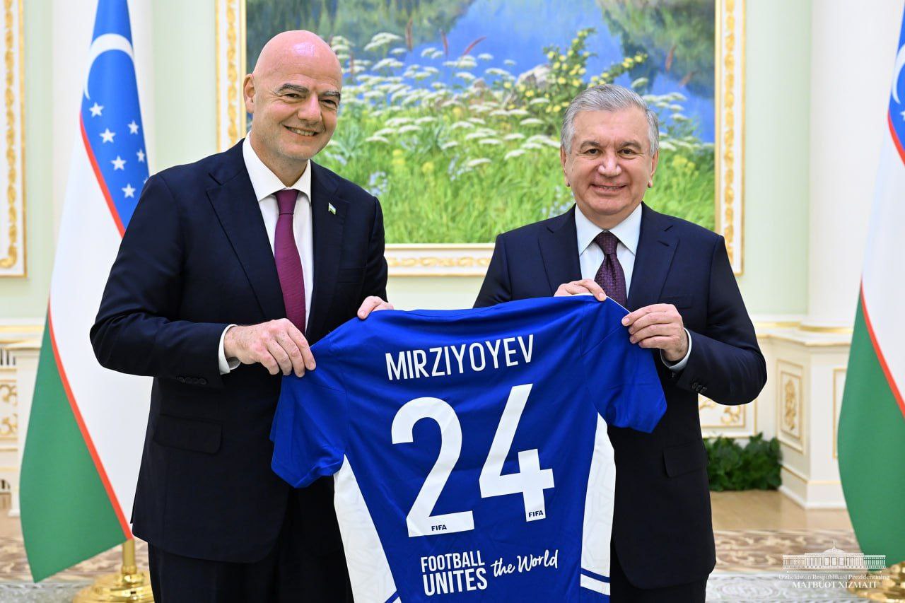 Photo: FIFA President Shavkat presented Mirziyoyev with a T-shirt with his last name