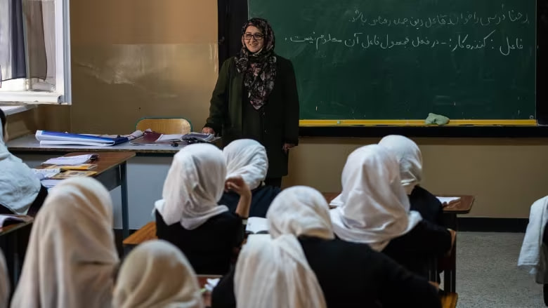 Female teachers seen with Taliban education minister were beaten