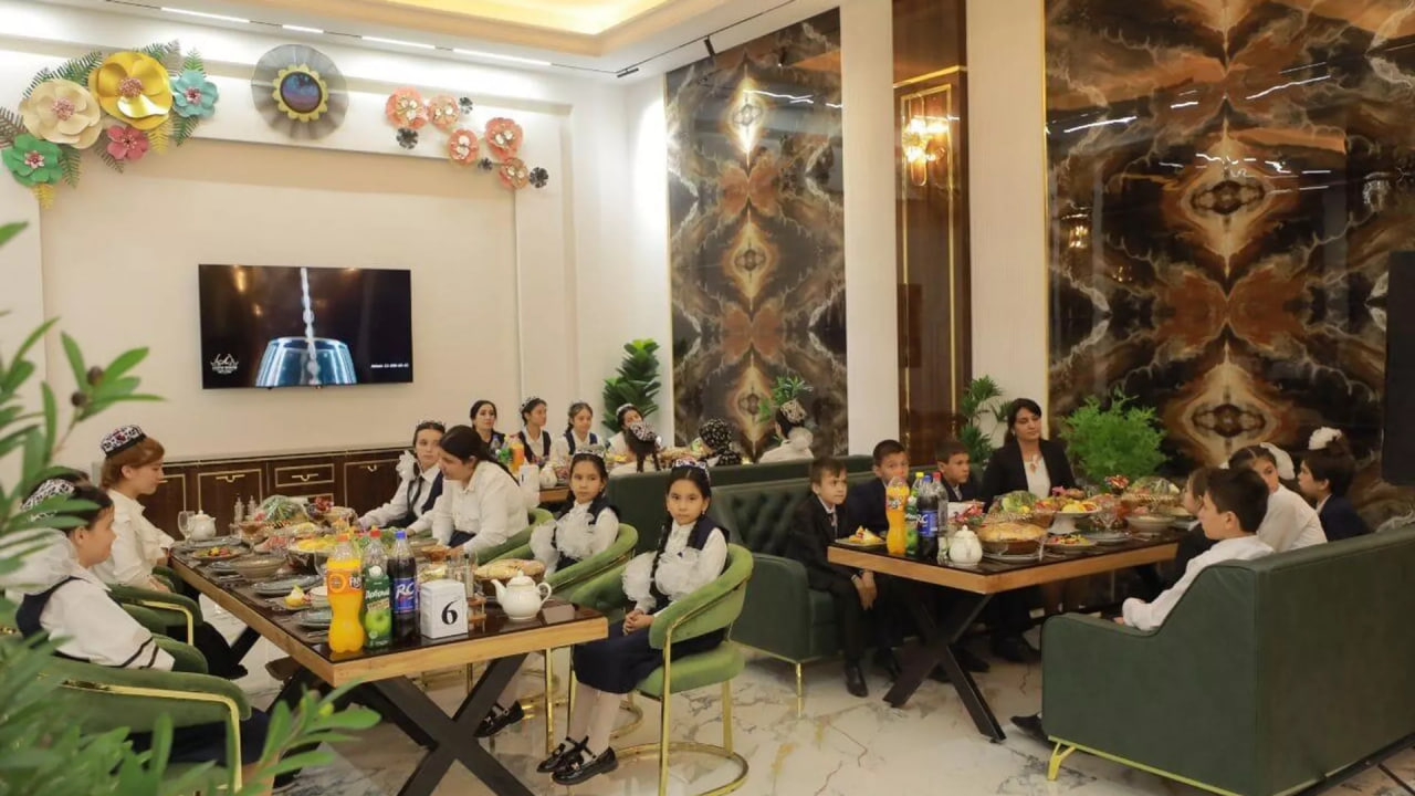 Orphans were treated to food at the opening of a new restaurant in Sogd