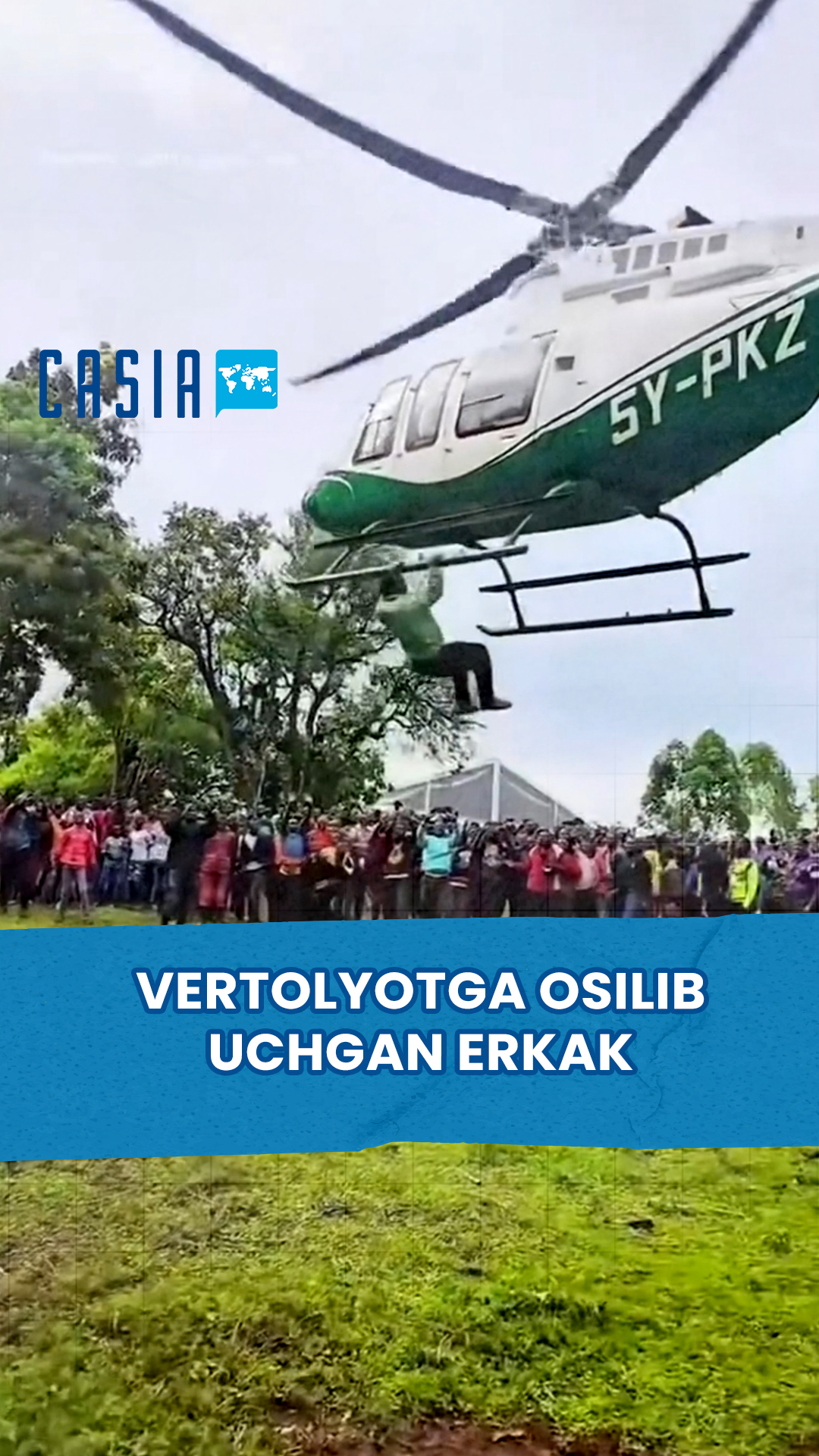 Man hangs from helicopter