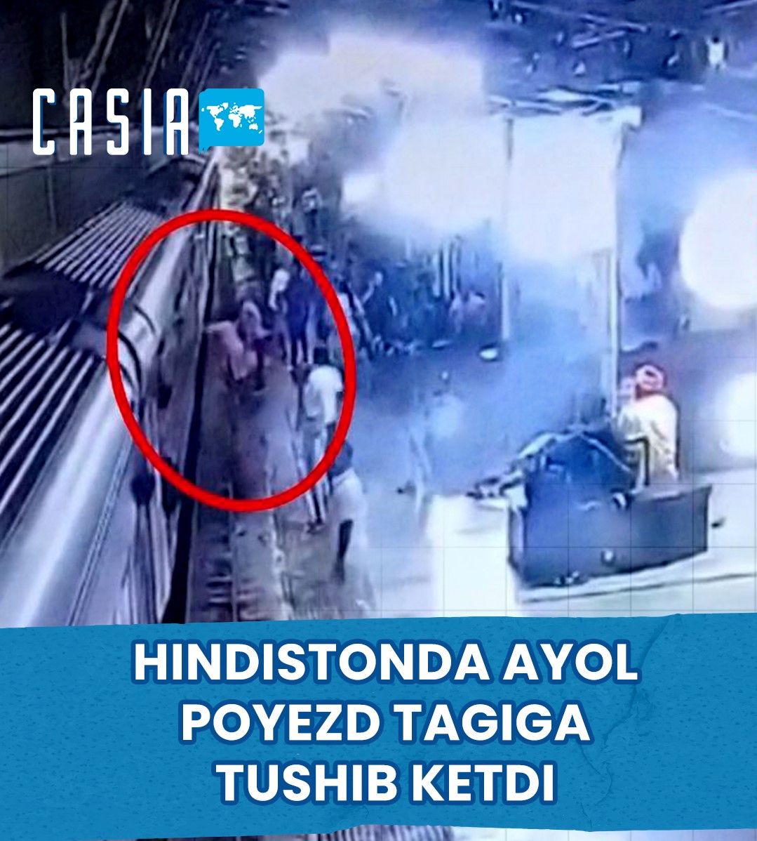 Woman falls under train in India