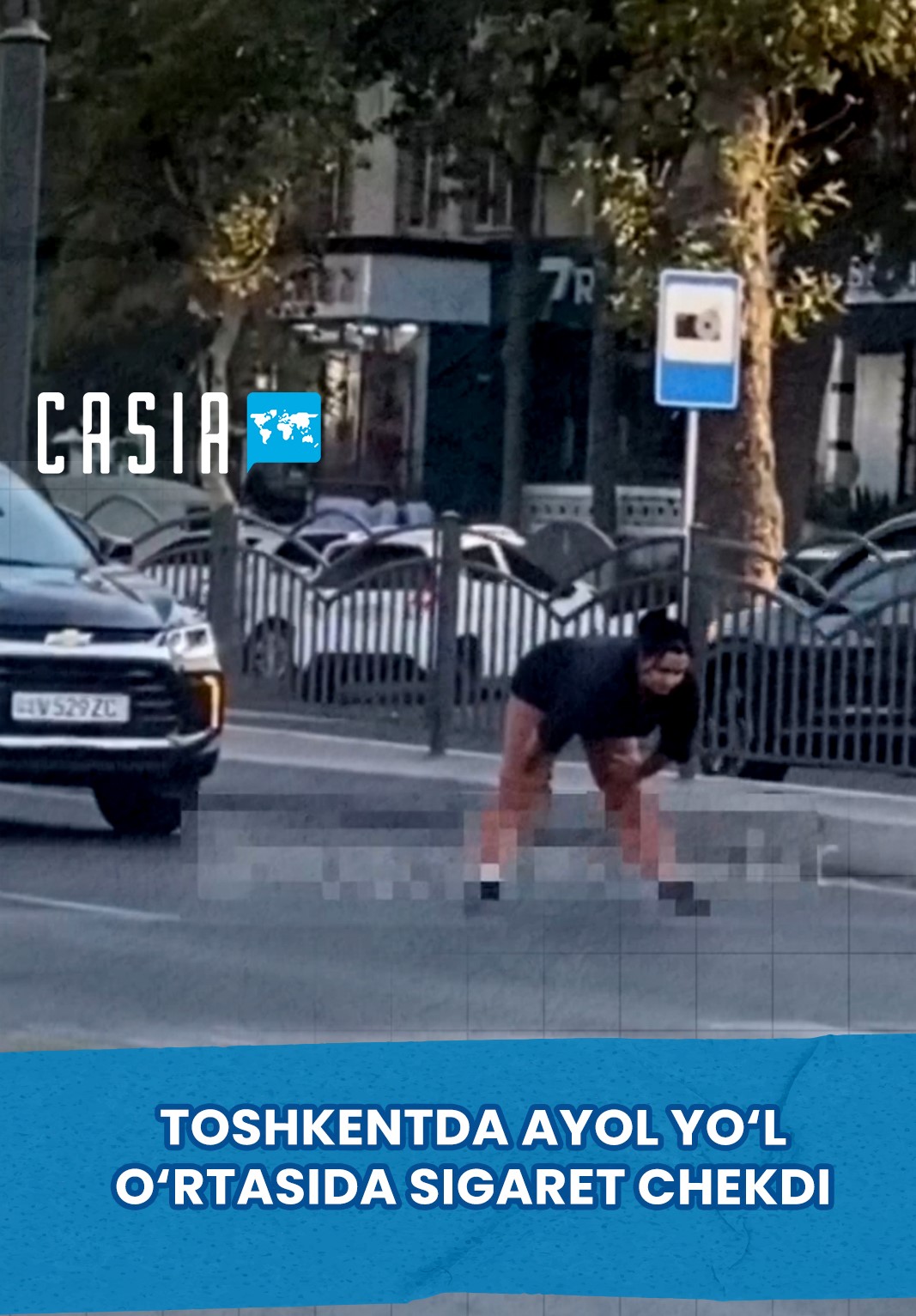A Woman Smoked a Cigarette in the Middle of the Road in Tashkent