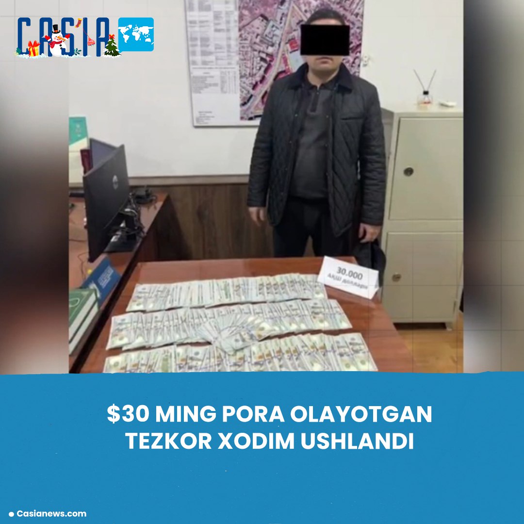 An оператив officer was caught while receiving a $30,000 bribe.