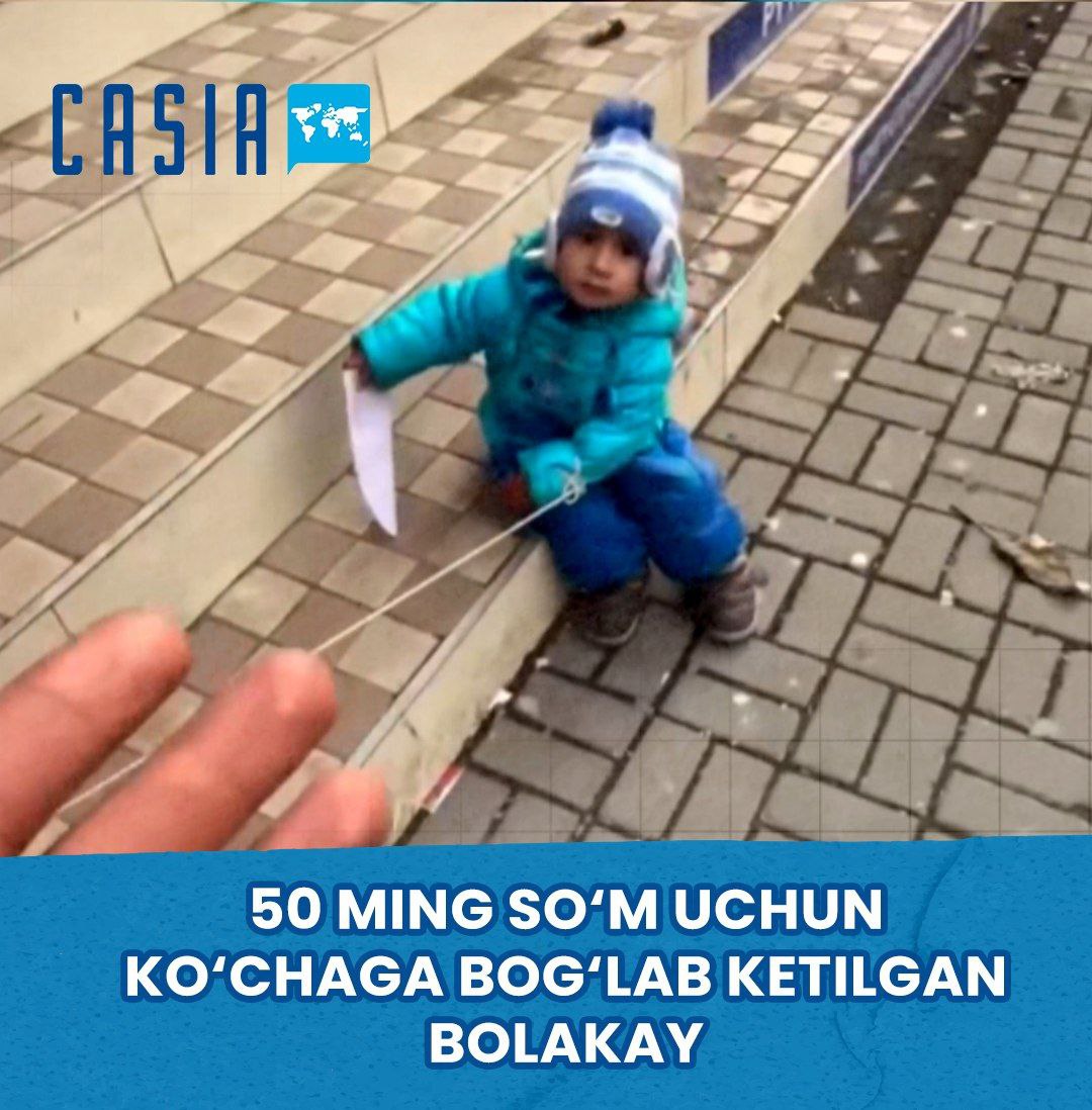 A boy tied to the street with a note saying "50 thousand soums"