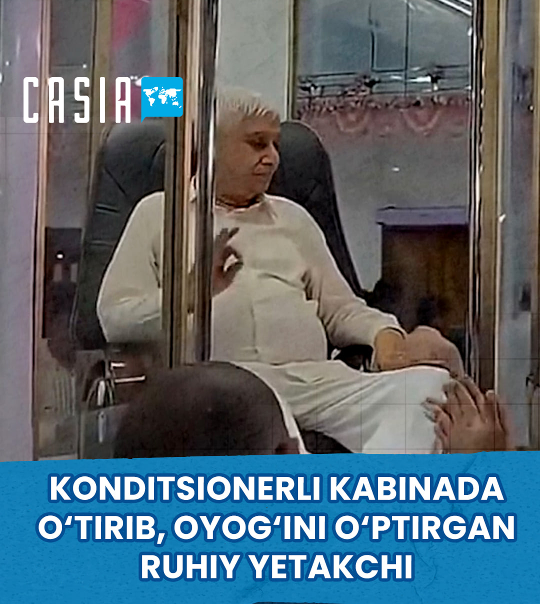 Spiritual leader criticized for sitting in an air-conditioned cabin while followers kissed his feet